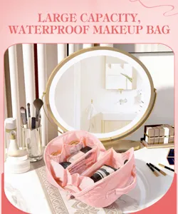 Detailed interior view of the large capacity quilted pink travel makeup bag with pockets