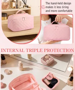 Close-up detail of a pink quilted cosmetic bag showing internal compartments and handle.