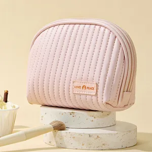 Elegant light pink PU leather semi-circle makeup bag for daily cosmetic storage
