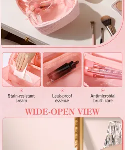 Detailed view of pink quilted travel makeup bag with brush compartments and leak-proof pockets