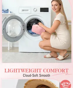Large pink quilted travel cosmetic bag displayed in a laundry room lifestyle scene