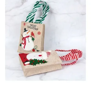 Festive Christmas burlap gift bags featuring cute Santa and snowman characters for holidays