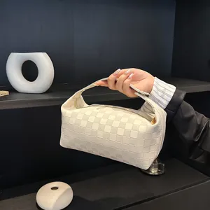 Elegante neceser de cuero PU a cuadros con gran capacidad y asa portátil de estilo retro.