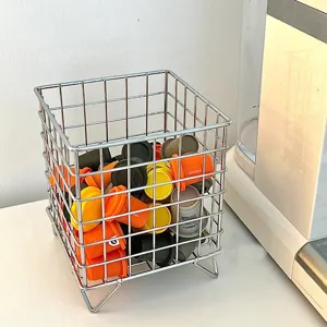 Draad opbergmand detailweergave, metalen gaas bureau organizer voor kleine voorwerpen.