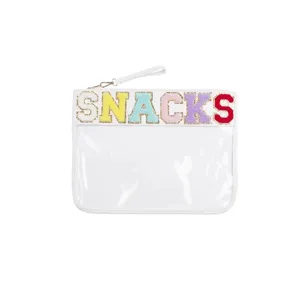 Clear PVC cosmetic bag featuring colorful chenille SNACKS embroidery and wrist strap