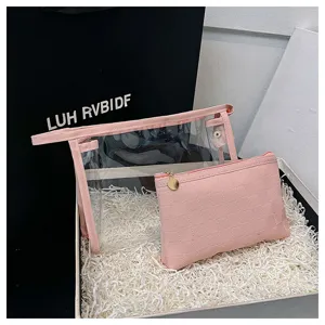 Detailed view of the pink checkered makeup bag and transparent PVC tote set inside a gift box