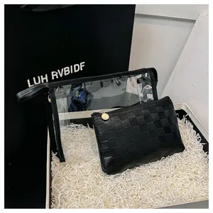 Two-piece travel cosmetic bag set featuring clear PVC and black checkered pouch