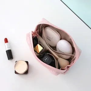 Large capacity portable pink cosmetic storage bag for makeup and toiletries organization