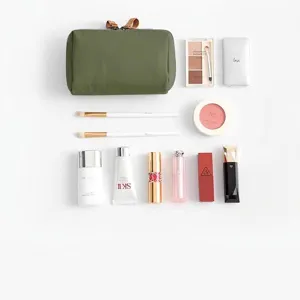 Portable mini olive green makeup pouch for cosmetics storage on white background