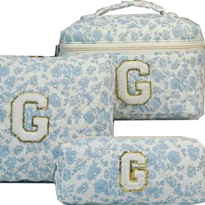 Three-piece quilted floral cosmetic bag set with white G letter embroidery patches