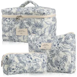 Elegant three-piece quilted floral cotton makeup bag set with blue flower patterns