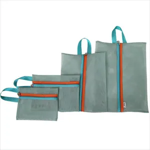 Detailed view of 4-piece multifunctional travel storage mesh bags in various sizes