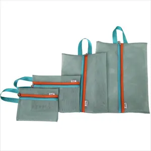 Set of four grey mesh travel storage bags with teal handles and orange zippers