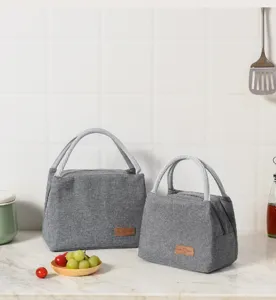 Two gray insulated Oxford cloth lunch bags in different sizes for picnics and office