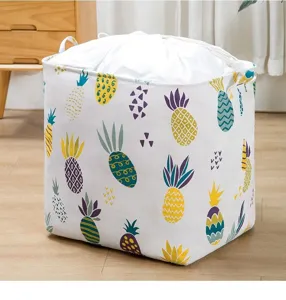 Large storage bag with drawstring closure and colorful pineapple pattern for quilts and clothes