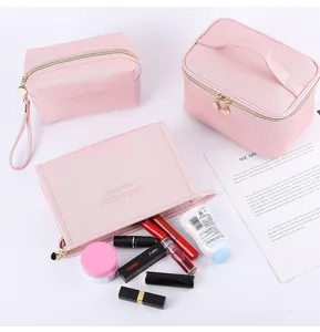 Pink cross-grain PU leather makeup bag set including three different sizes and styles