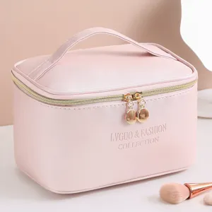 Pink cross-grain PU leather makeup bag with portable handle and dual gold zippers