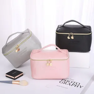Portable cross-grain PU leather makeup bags in silver, pink, and black colors