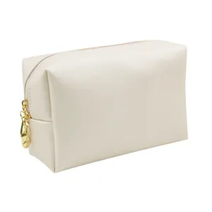 Cream octagonal waterproof cosmetic bag with textured finish and gold zipper