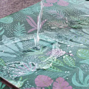 Waterproof large floral quilt storage bag showing water-resistant fabric surface
