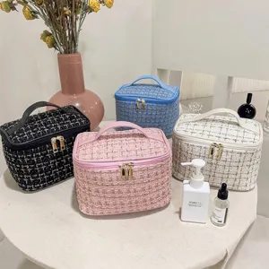 Large tweed cosmetic storage bags in multiple colors for stylish travel organization