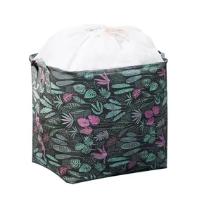 Large capacity fabric drawstring storage bag with tropical leaf pattern for home quilts