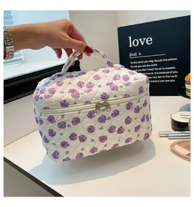Large capacity quilted cotton cosmetic bag with purple floral print and top handle