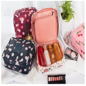 Close-up detail of large capacity waterproof floral and cherry travel cosmetic bags