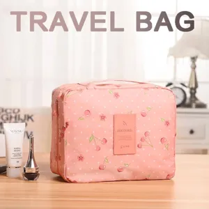 Large capacity pink cosmetic travel bag with cherry pattern and waterproof fabric design