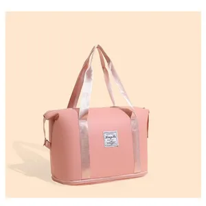 Grand sac de voyage pliable et imperméable rose pour le fitness et le sport