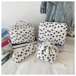 4-piece quilted floral makeup bag set with travel storage organizers and drawstring pouch