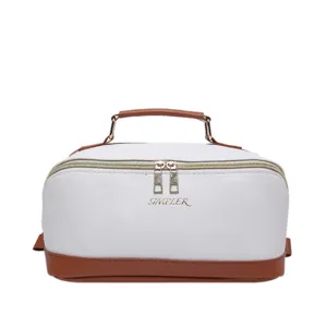 Große Kosmetiktasche aus weißem PU-Leder mit braunem Rand und Simpler-Logo