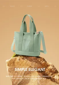 Detail of light green canvas tote bag on rock showing minimalist commuting style.