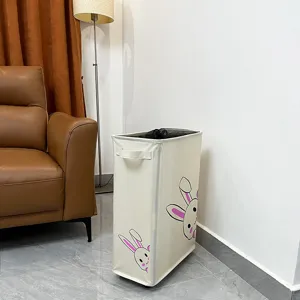 Slim laundry hamper with wheels and cute rabbit pattern for home clothing storage