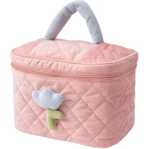 Charming pink quilted corduroy cosmetic bag featuring a cute blue tulip flower decoration