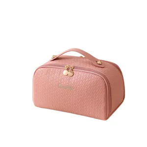 Eleganter rosa Kosmetikkoffer mit großer Kapazität für Reisen und Tragegriff in Rautenoptik