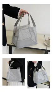Grey nylon mesh handbag for cosmetics, toiletries and beach essentials detail view