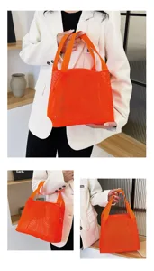 Detailed view of the vibrant orange nylon mesh tote bag for cosmetics and beach use