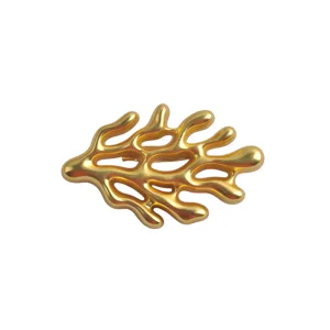Elegant matte gold coral-shaped brooch with organic ocean design for suits and coats