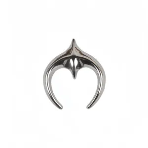 Macro detail view of polished silver-tone stainless steel crescent star brooch pin