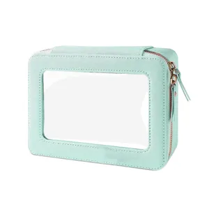Detailansicht der mintgrünen PU-Kosmetiktasche mit transparentem Fenster und Roségold-Zipper