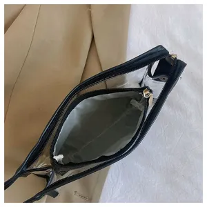 Interior detail of transparent PVC travel cosmetic bag with black inner zipper pouch