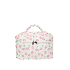 Large quilted floral cosmetic bag with pink rose print and a sturdy top handle
