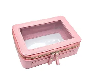 Nahaufnahme rosa PU-Leder Kosmetiktasche mit Klarsichtfenster und Goldzipper