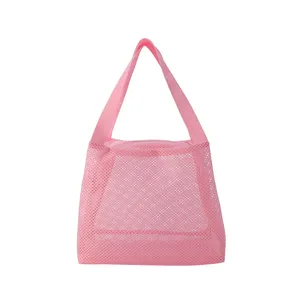 Vibrant pink nylon mesh cosmetic bag with sturdy portable handles for beach or bathroom storage