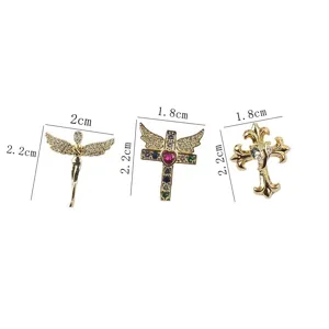 Measurement detail of gold mini cross brooches with rhinestone accents for clothing