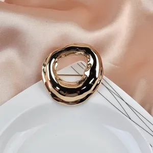 Irregular geometric gold metal brooch with minimalist design for elegant suit accessories