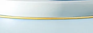 Close-up detail shot of the smooth light blue basin surface featuring a sleek golden accent rim.