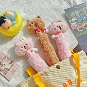 Cute plush animal ballpoint pens, featuring capybara and pink bunny designs, soft and creative stationery gifts.