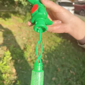 Kinder Cartoon Dinosaurier Seifenblasenstab Outdoor Handheld Seifenblasen Spielzeug.
